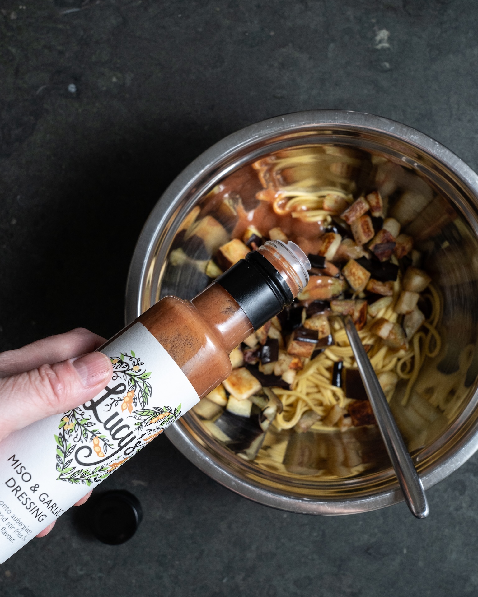 Brushing miso glaze onto salmon